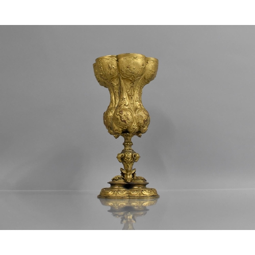 169 - A Gilt Bronze Chalice with Fine Embossed Relief with Cherubs, Biblical Scenes and Scrolled Decoratio... 