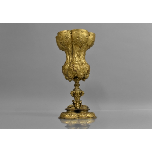 169 - A Gilt Bronze Chalice with Fine Embossed Relief with Cherubs, Biblical Scenes and Scrolled Decoratio... 