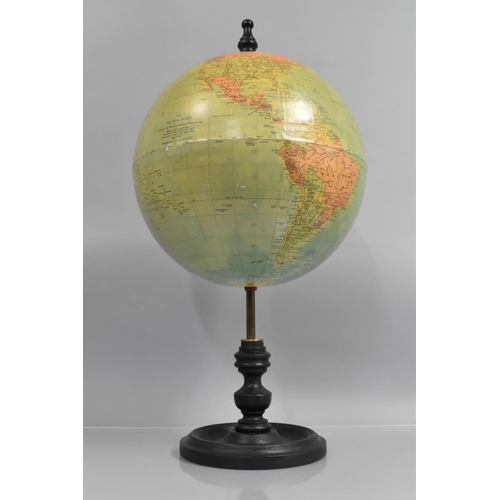 85 - A Mid 20th Century 12 Inch Terrestrial Globe, Supported on a Brass and Ebonised Wooden Stand, 63cm h... 