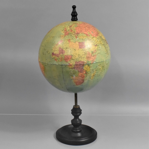 85 - A Mid 20th Century 12 Inch Terrestrial Globe, Supported on a Brass and Ebonised Wooden Stand, 63cm h... 