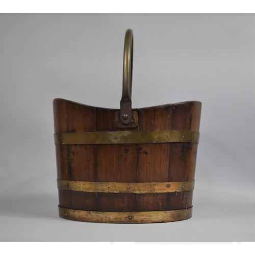 65 - A 19th Century Oval Brass Banded Oak Bucket with Brass Carry Handle, 27cms High