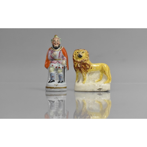 394 - Two 19th Century Staffordshire Nursery Figures, Lion and Figure of King Pixie, 8cms and 11cms