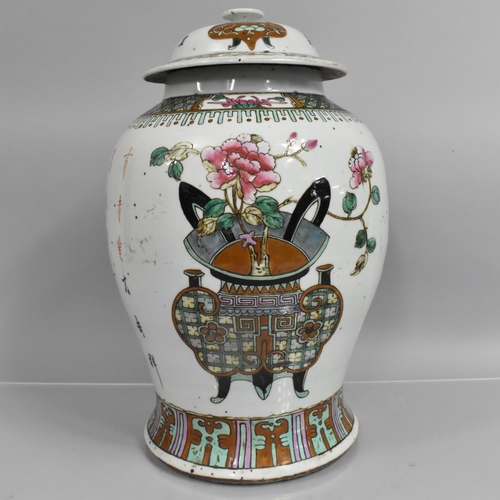 305 - A Large Chinese Porcelain Vase and Cover, Decorated in Polychrome Enamels with Blossoming Plants and... 