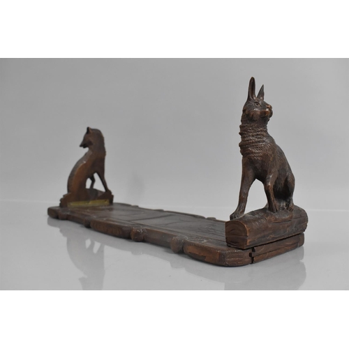 76 - A Carved Black Forest Book Slide with Hinged Fox and Hare End Plates, 36cms Long when Closed