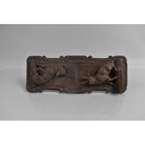 76 - A Carved Black Forest Book Slide with Hinged Fox and Hare End Plates, 36cms Long when Closed