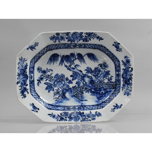 367 - An 18th Century Chinese Blue and White Platter decorated with Walled Garden and Blossoming Willow Tr... 