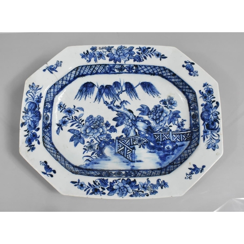 367 - An 18th Century Chinese Blue and White Platter decorated with Walled Garden and Blossoming Willow Tr... 