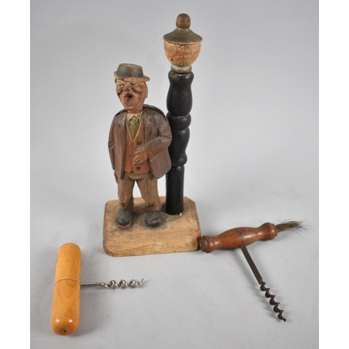 103 - A Carved Novelty Continental Bottle Opener and Corkscrew Set in the Form of a Singing Gent together ... 