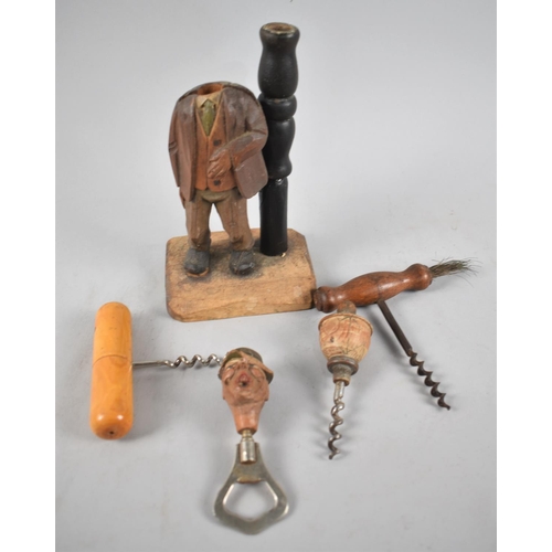 103 - A Carved Novelty Continental Bottle Opener and Corkscrew Set in the Form of a Singing Gent together ... 