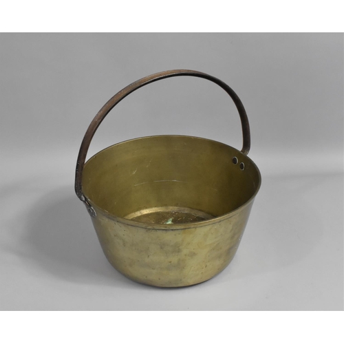 106 - A Vintage Brass Jam Kettle with Iron Loop Handle, 31cms Diameter