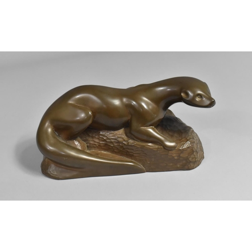 137 - A Bronze Effect Resin Study of Otter On Rock, 25cms Wide