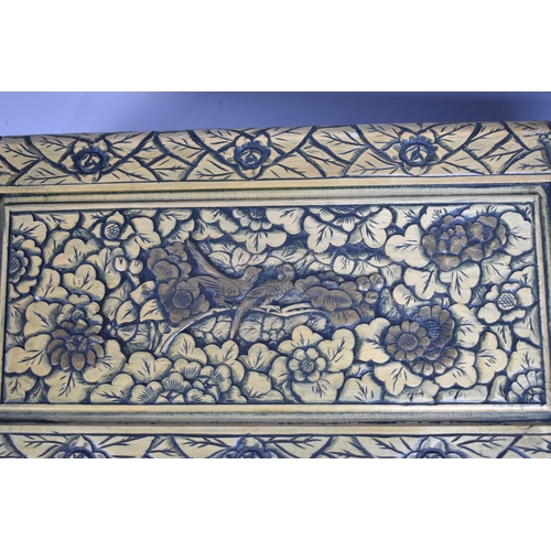 143 - An Oriental Carved Wooden Chest decorated with Flowers and Birds, 70cms Wide