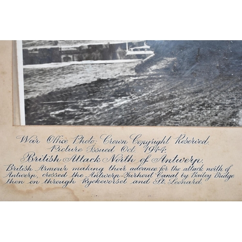 150 - A Framed WWII Photograph, British Armour Advance over Antwerp Canal 1944, 28c21cms