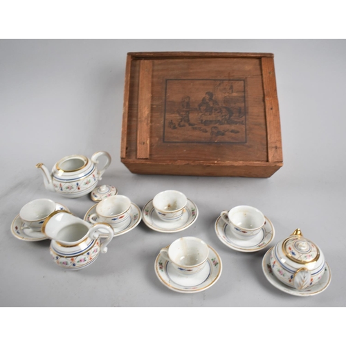 198 - A Continental China Dolls Tea Service in Wooden Box, Some Condition Issues