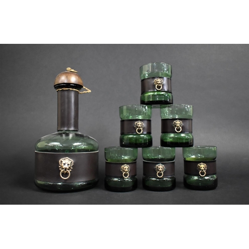 329 - A Green Glass Decanter and Glasses Set Decorated with Leather Bands with Ring Lion Masks