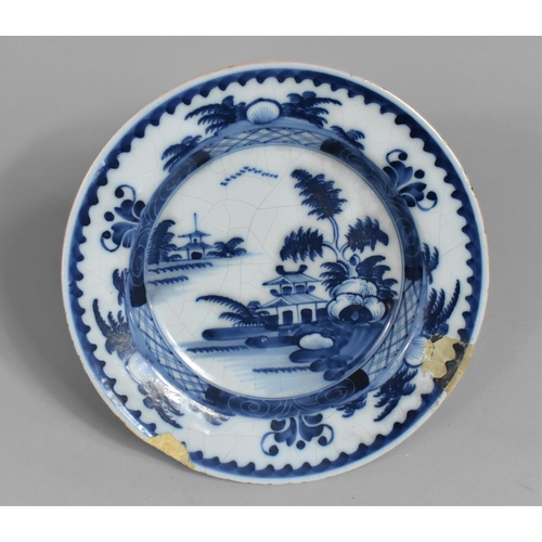 344 - A Blue and White Delft Plate Decorated with Oriental River Village Scene, Condition Issues and Resto... 