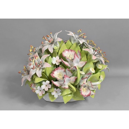 347 - A Large and Heavy Continental Ceramic Centerpiece, Basket of Lilies, 31cm high