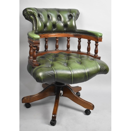 452 - A Buttoned Backed Green Leather Swivel Office Chair