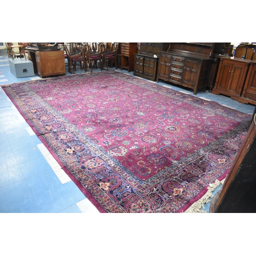 459 - A Large Vintage Pattern Carpet, 534x365cm, Complete but Has Small Cut to Fit Fireplace