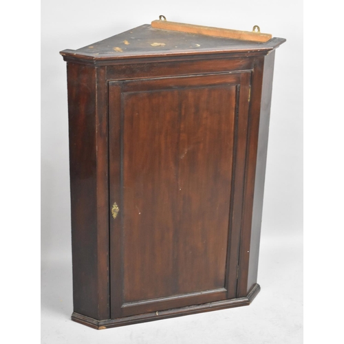 475 - A Late 19th Century Mahogany Wall Hanging Corner Cabinet with Panelled Door, 73cm wide