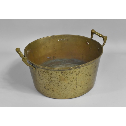 497 - A Circular Heavy Brass Two Handled Cooking Pot, 30cm diameter