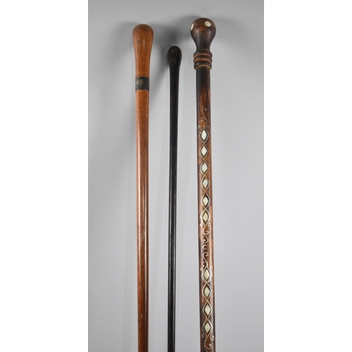 62 - A Collection of Three Vintage Walking Canes, One with Mother of Pearl Inlay