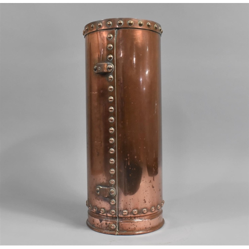 63 - A Vintage Cylindrical Studded Copper Canister, 19cms Diameter and 47cms High