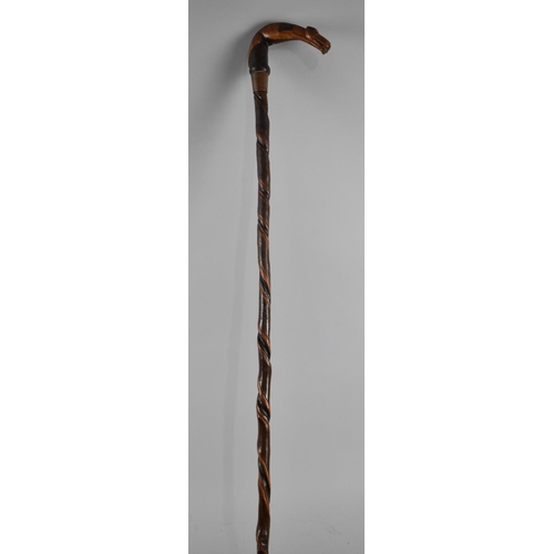 69 - A Victorian Coursing Stick with Carved Greyhound Handle and Twisted Shaft