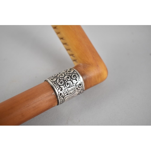 72 - A Horn handled Malacca Walking Cane with Silver Band Hallmarked and Dated 1895