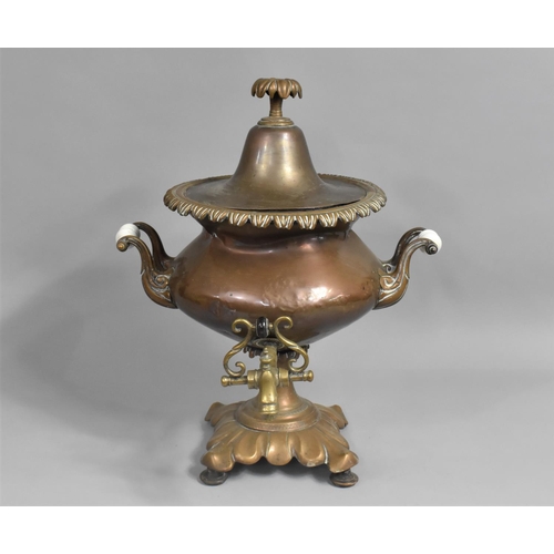 75 - A Late Victorian Copper Samovar with Brass Tap and Ceramic Handles, 48cms High