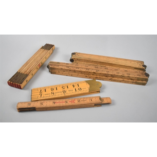 82 - A Collection of Vintage Folding Rulers to include Barrow and Jackson, Hogs Head, Swedish and Brass M... 