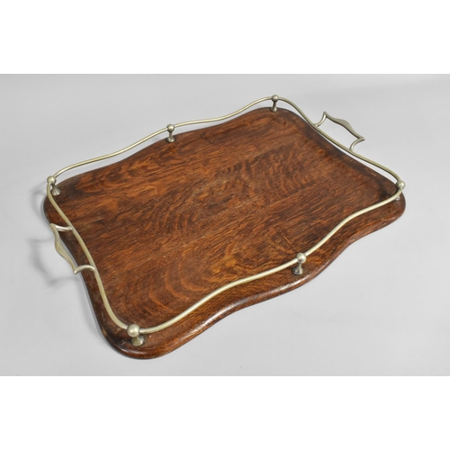 94 - An Edwardian Oak Drinks Tray with Silver Plated Gallery and Handle, 53cms by 35cms