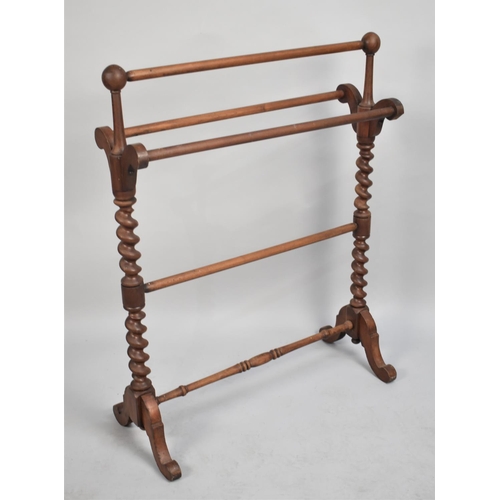 98 - A Late Victorian/Edwardian Towel Rail with Barley Twist Supports and Scrolled Feet, 66cms Wide