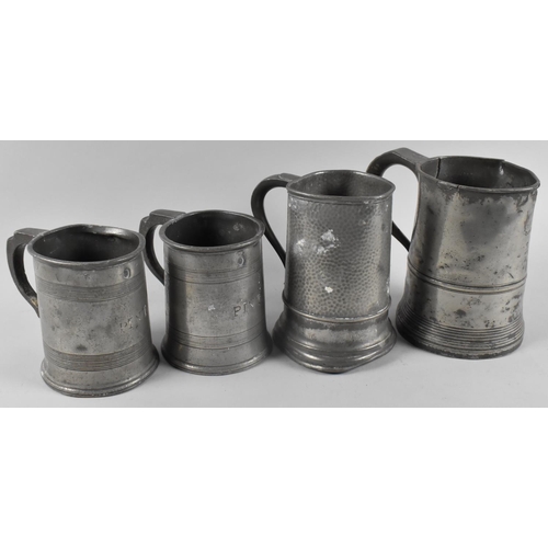 95 - A Victorian Quart Pewter Measuring Tankard, Two Pint Measures and One Other