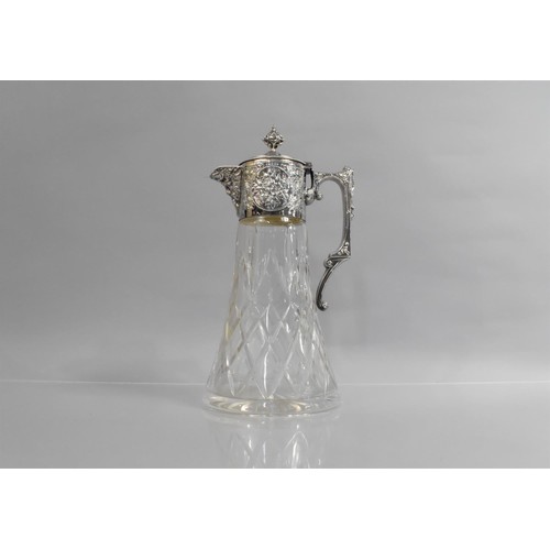 228 - A Nice Quality Cut Glass Claret Jug with Silver Plated Mask Head Mount having Hinged Lid, 28cms High