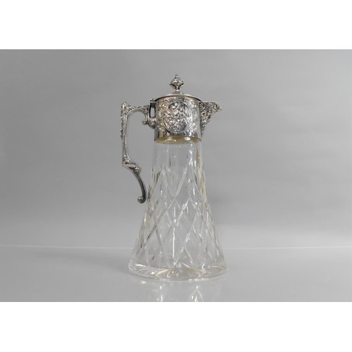 228 - A Nice Quality Cut Glass Claret Jug with Silver Plated Mask Head Mount having Hinged Lid, 28cms High