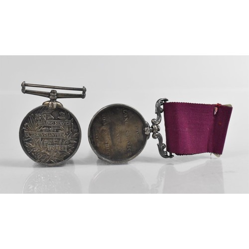 258 - A Victorian Volunteer Long Service Medal (Unnamed) and a Victorian Long Service, Good Conduct Medal ... 