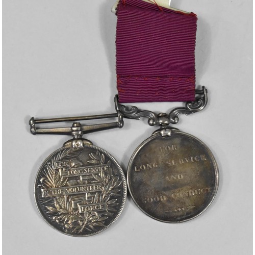 258 - A Victorian Volunteer Long Service Medal (Unnamed) and a Victorian Long Service, Good Conduct Medal ... 