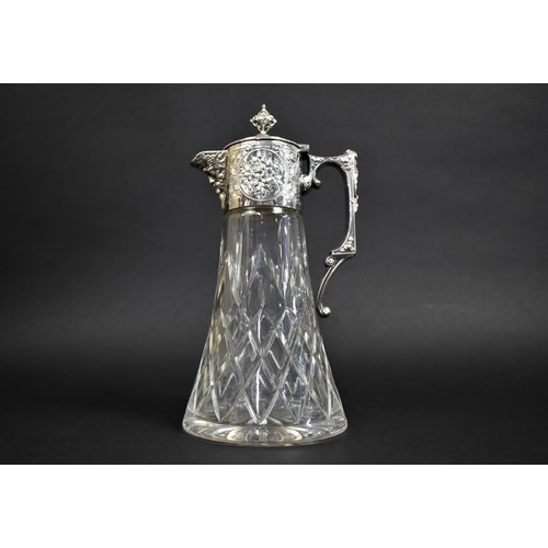 228 - A Nice Quality Cut Glass Claret Jug with Silver Plated Mask Head Mount having Hinged Lid, 28cms High