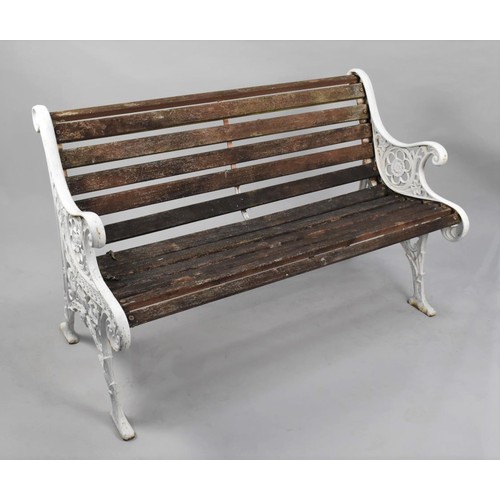 126 - A Wooden Slatted Cast Iron Bench, the Ends of Scrolled Form with Urn and Floral Design, 126cms Wide