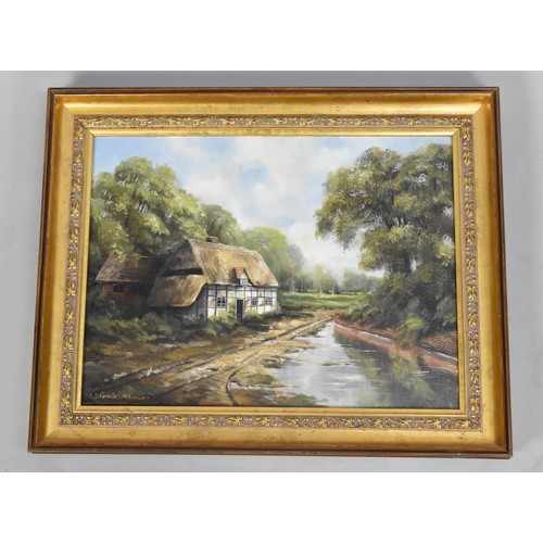 215 - A Gilt Framed Oil on Canvas, Half Timbered Cottage, C.D Howells, 1983. 40x30cms