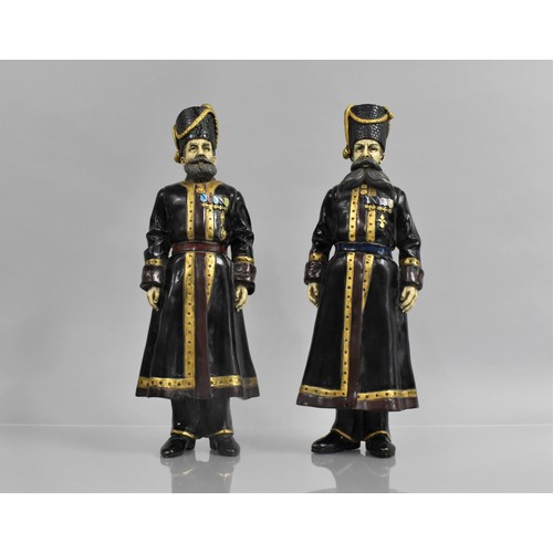 183 - A Pair of Large Russian Cold Painted Cossack Figures in the Manner of Faberge, Modelled as Kudinov a... 