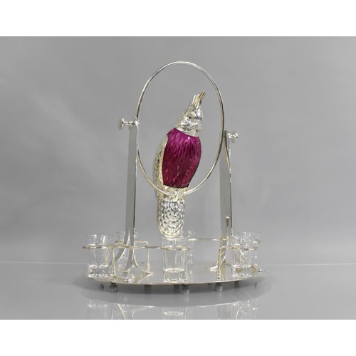 233 - A Silver Plated Coloured Glass and Plain Glass Novelty Tot Set, The Decanter in the Form of a Cockat... 