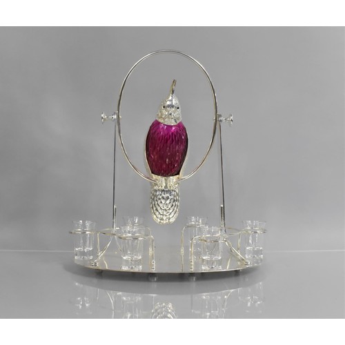 233 - A Silver Plated Coloured Glass and Plain Glass Novelty Tot Set, The Decanter in the Form of a Cockat... 