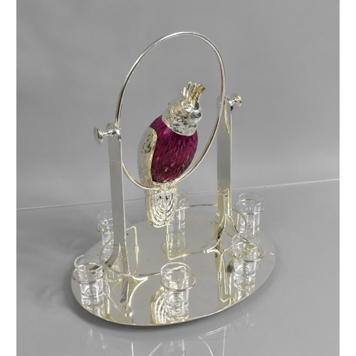 233 - A Silver Plated Coloured Glass and Plain Glass Novelty Tot Set, The Decanter in the Form of a Cockat... 