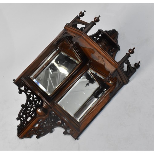 108 - An Edwardian Mahogany Wall Hanging Mirrored Corner Shelf Unit with Raised and Pierced Gallery