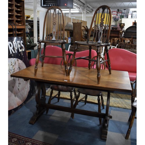 451 - An Ercol Style Rectangular Dining Table and Four Hoop Back Chairs with Pierced Splats, Chairs Stampe... 