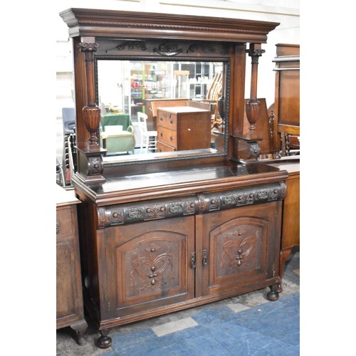 461 - A Late Victorian Mahogany Mirror Backed Sideboard with Two Carved Centre Drawers Over Panelled Doors... 