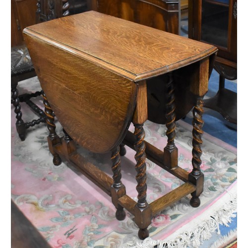 457 - A Mid 20th Century Oak Barley Twist Gate Leg Oval Top Drop Leaf Table, 83cms Wide