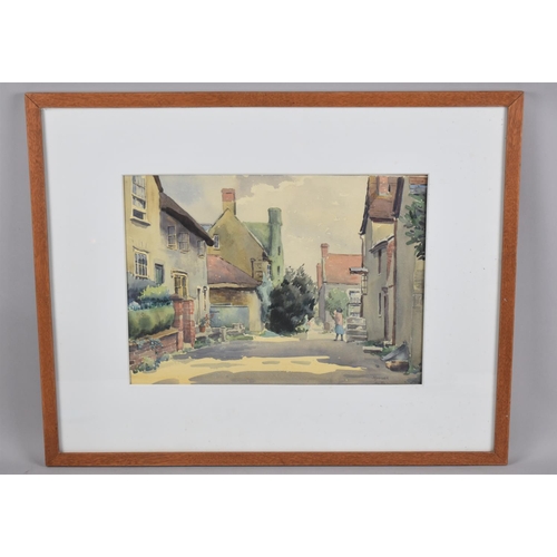 105 - A Framed Watercolour Depicting Village Street Signed S Jepson, 35x26cms